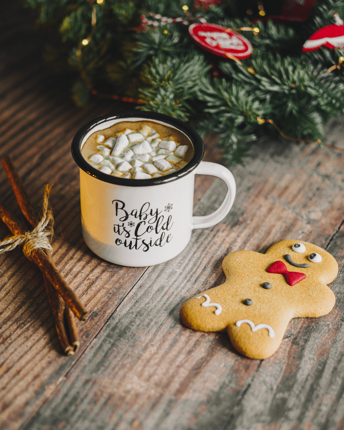 Gingerbread buddy meets his warm winter friend – mug of cocoa awaits a sweet dunking!