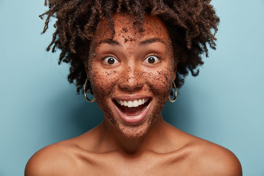 Beautiful-woman-with-Jumping-Java-exfoliating-creamy-scrub-on-her-face